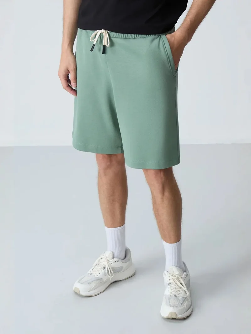 تومي لايف TOMMY Men's Cotton-Blend Sweat Shorts