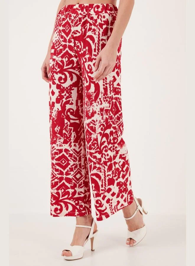 ليلا بنطلون واسع بخصر عالٍ بنقش ليلى للنساء