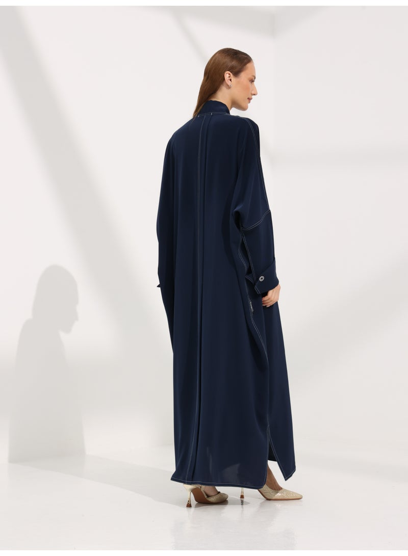 Khan&Co. Seven Seas Indigo indigo blue crepe fabric abaya with two silver KHAN&CO logo buttons - by Abdullah Khan - Image 2