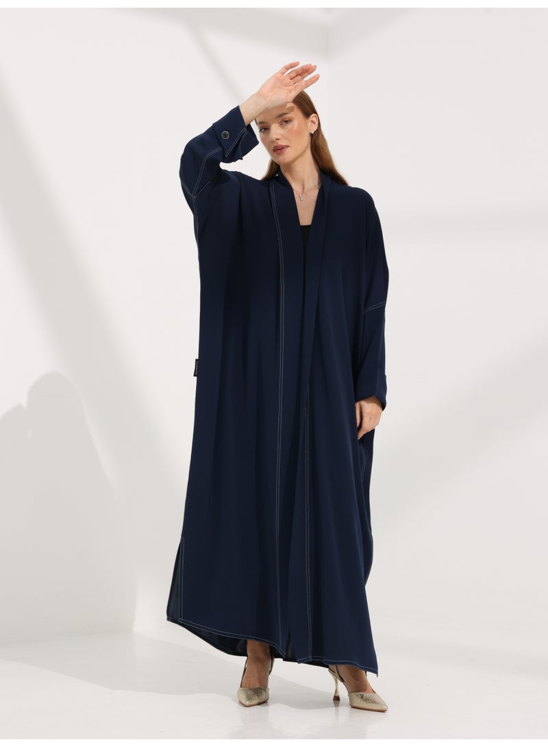 Khan&Co. Seven Seas Indigo indigo blue crepe fabric abaya with two silver KHAN&CO logo buttons - by Abdullah Khan - Image 3