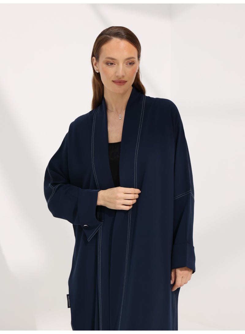 Khan&Co. Seven Seas Indigo indigo blue crepe fabric abaya with two silver KHAN&CO logo buttons - by Abdullah Khan - Image 4