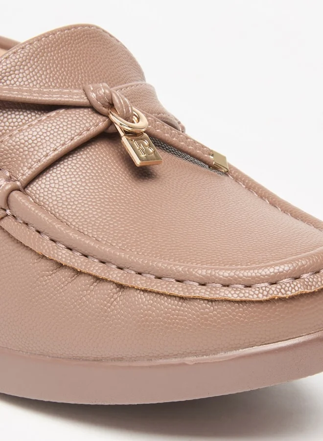 فلورا بيلا من شو إكسبرس Women's Solid Slip-On Mules with Block Heels and Tie-Up Detail