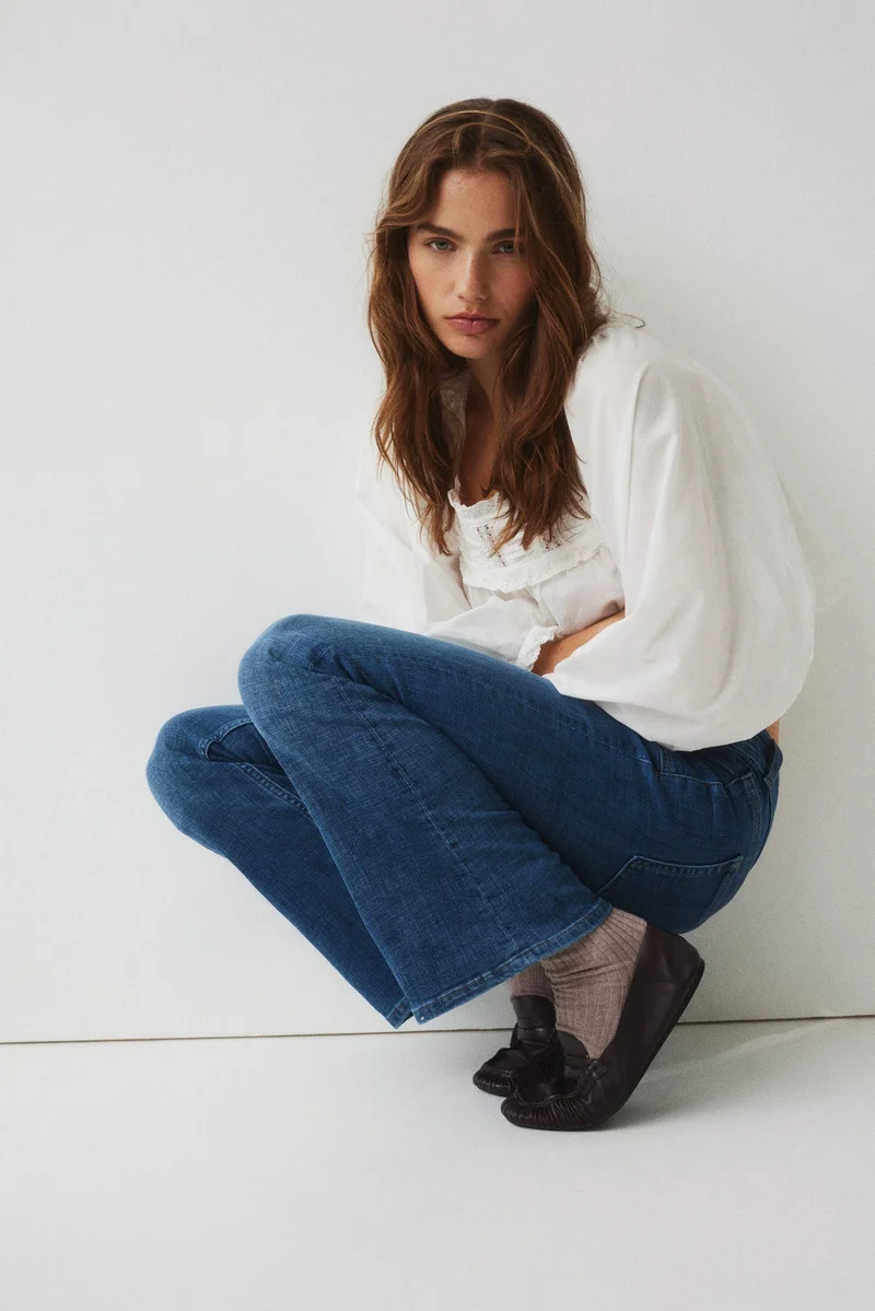 اتش اند ام جينز بحافة سفلية واسعة وخصر منخفض