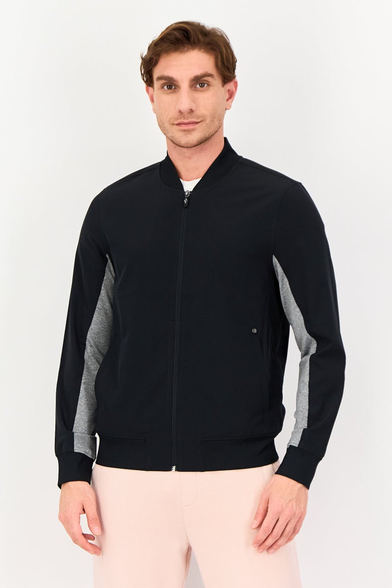 SKECHERS Men Sportswear Fit Long Sleeve Outdoor Varsity Jacket, Black - Image 1