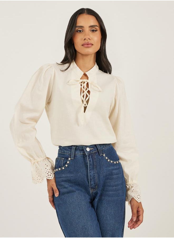 Styli Women Cream Solid Volume Sleeves Lace-Up Top  - Image 1