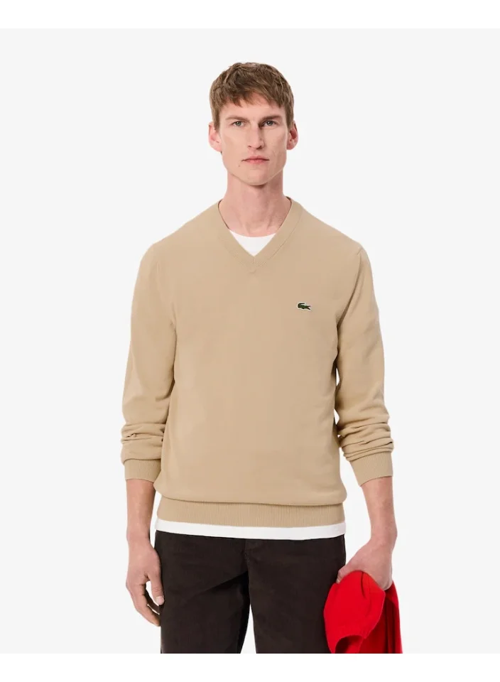 لاكوست كنزة بياقة على شكل حرف  أحادية اللون