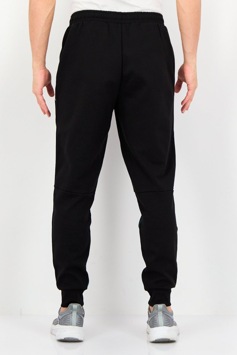 PUMA AMG Men Sportswear Fit Brand Logo Outdoor Sweatpants, Black - Image 3