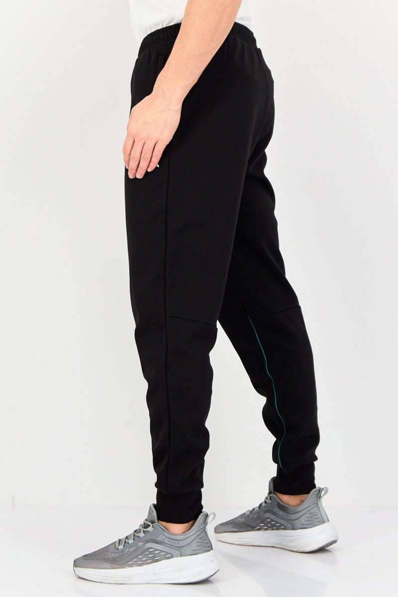 PUMA AMG Men Sportswear Fit Brand Logo Outdoor Sweatpants, Black - Image 2
