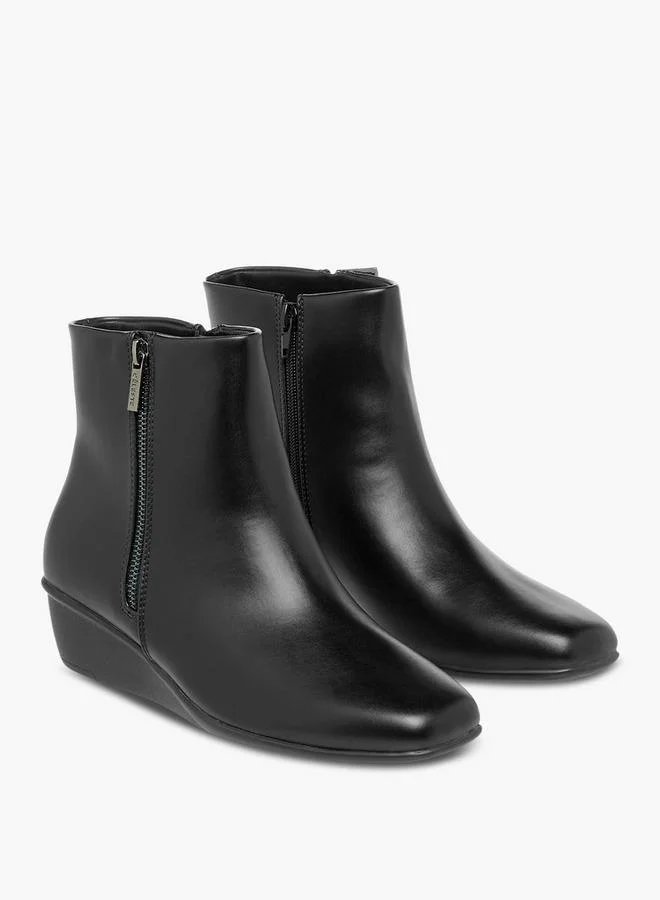 سيليست Women's Solid Wedge Heel Ankle Boots with Zip Closure