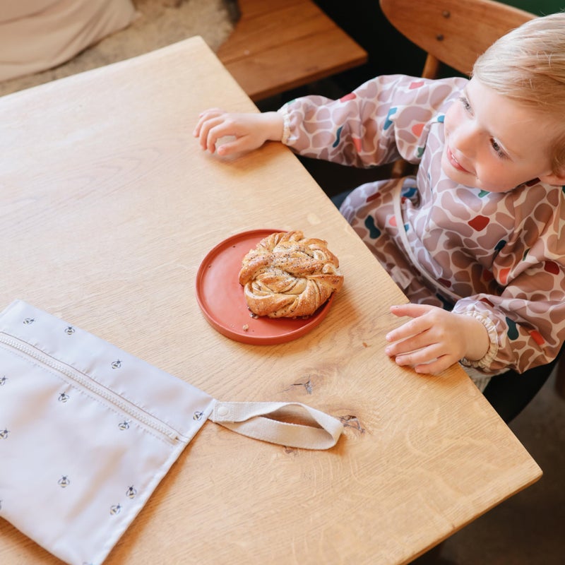 mushie Long Sleeve Baby Bib | Water Resistant Adjustable Fit for Ages 6-24 Months (Abstract Blob) - Image 4