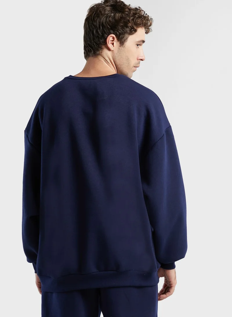 The Giving Movement Regular Sweatshirt