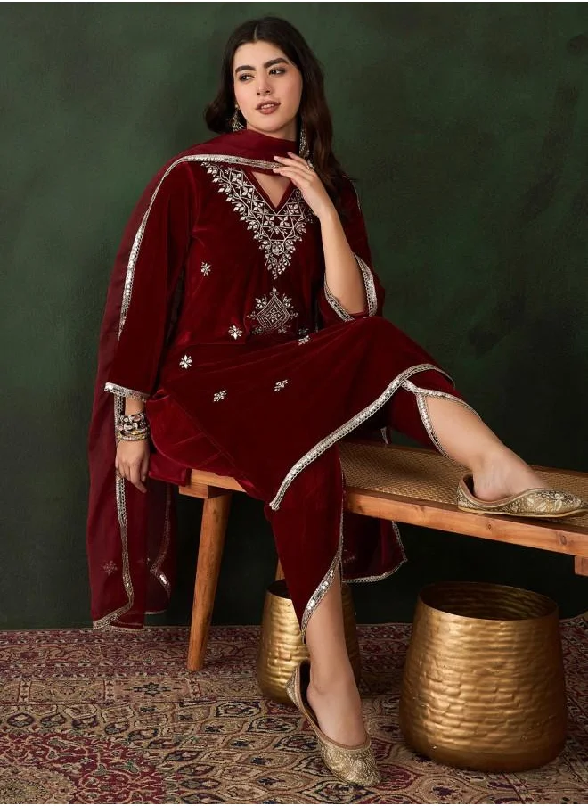 آي شين Festive Women Maroon Velvet Kurta Set with Embroidered pattern Tunic and Palazzo features a Round neckline and Three-Fourth Sleeve secured with Elastic closure and styled in Straight Fit ideal for Festive moments — crafted to elevate your special moments.