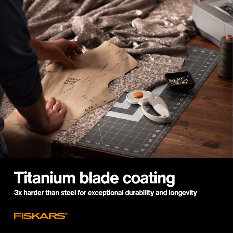 Fiskars 60mm Rotary Cutter for Fabric with Ergonomic Loop Grip And Comfort Handle, Titanium Rotary Fabric Cutter for Thick Materials, Easy and Safe Blade Change, Sewing Supplies and Quilting Tools - Image 4
