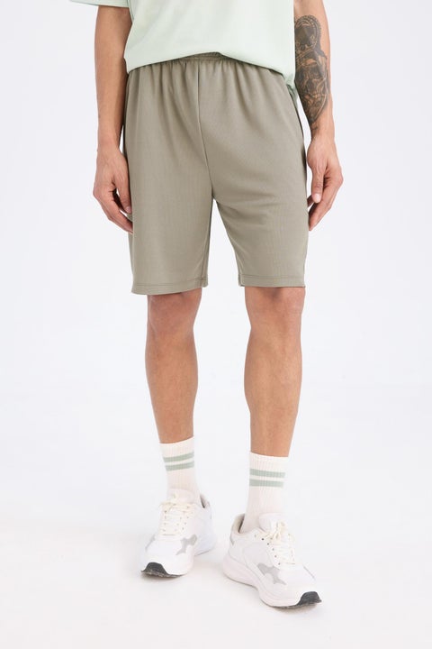 شورت قصير رياضي قصة عادية من DeFactoFit