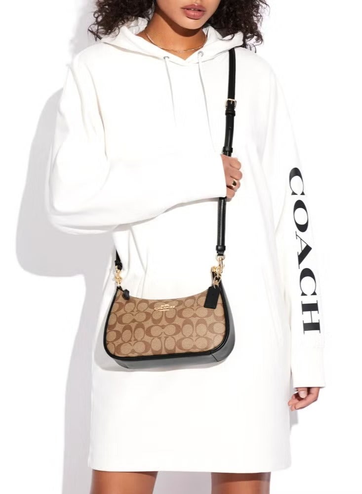 كوتش اوت ليت حقيبة كتف نسائية من Coach Teri مصنوعة من قماش مميز، حقيبة يد نسائية، حقيبة هوبو نسائية، حقيبة توت نسائية، حقيبة سفر نسائية، لون كاكي-أسود 24 سم - Image 2