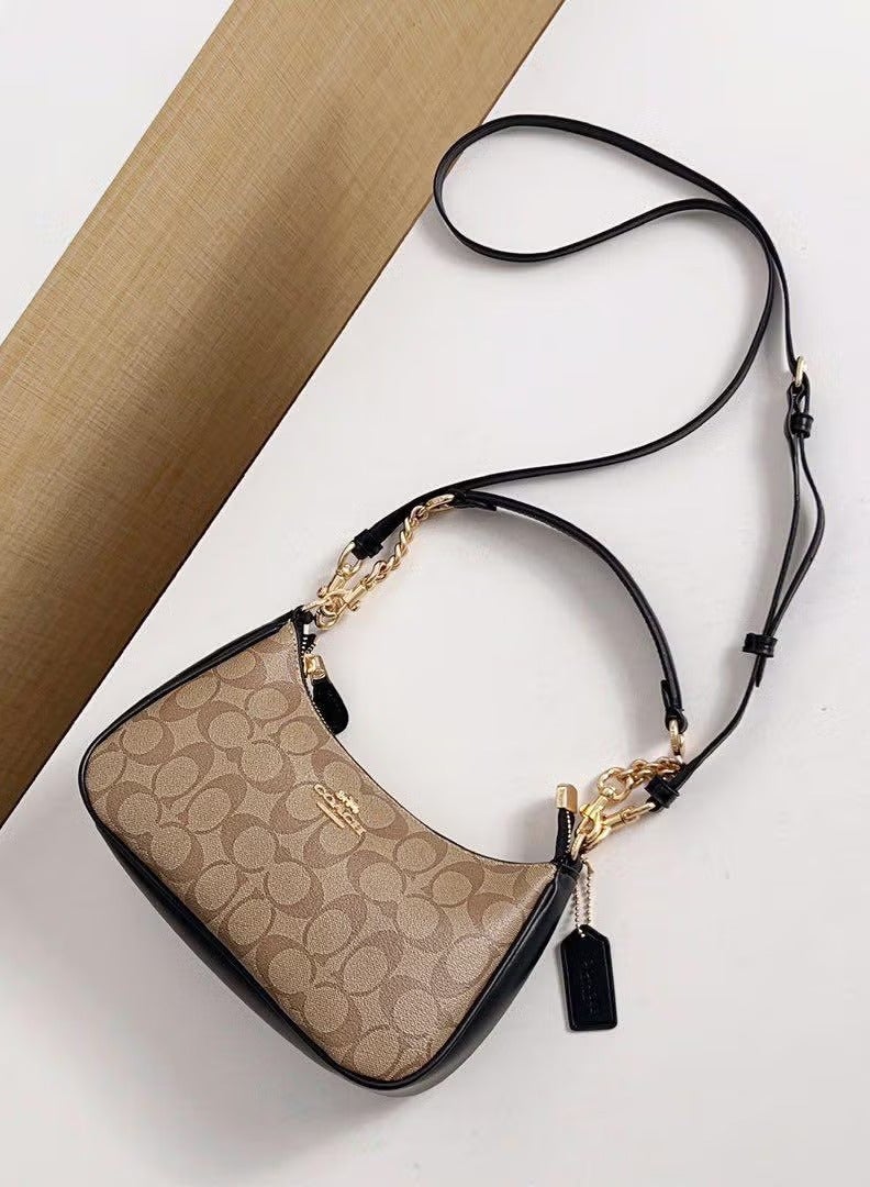 كوتش اوت ليت حقيبة كتف نسائية من Coach Teri مصنوعة من قماش مميز، حقيبة يد نسائية، حقيبة هوبو نسائية، حقيبة توت نسائية، حقيبة سفر نسائية، لون كاكي-أسود 24 سم - Image 3