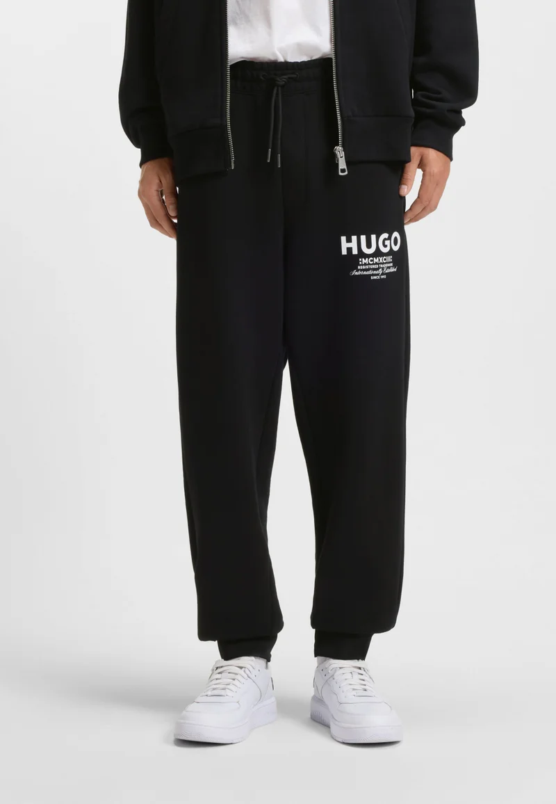 هوجو بنطلون رياضي قطني تيري بطبعة شعار