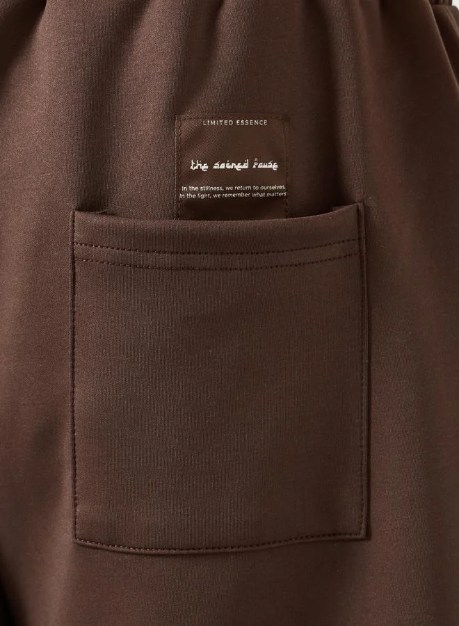 Styli  Men Brown Wide Leg Track Pants for Men | Best Price UAE