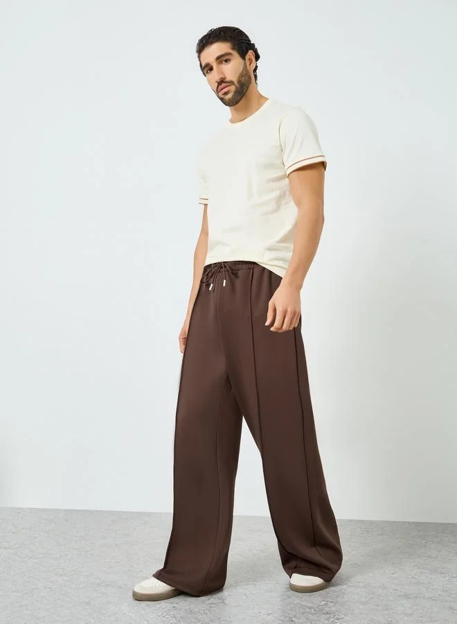 Styli  Men Brown Wide Leg Track Pants for Men | Best Price UAE