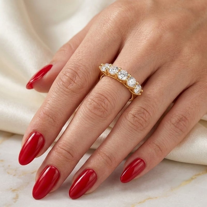 An elegant gold ring, studded with five sparkling round zircon stones, a delicate and attractive design that adds a touch of luxury and sophistication to your look at all times. - Image 2