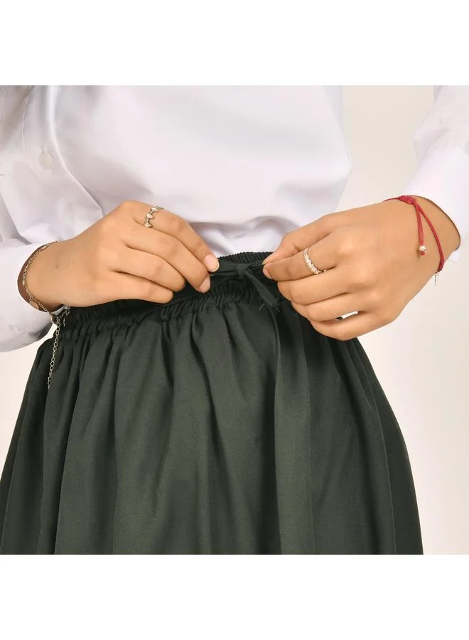HAWRAA ABAYA تنورة اخضر زيتي موديل ميدي بخصر مطاطي مع ربطة جانبية و جيوب بغطاء