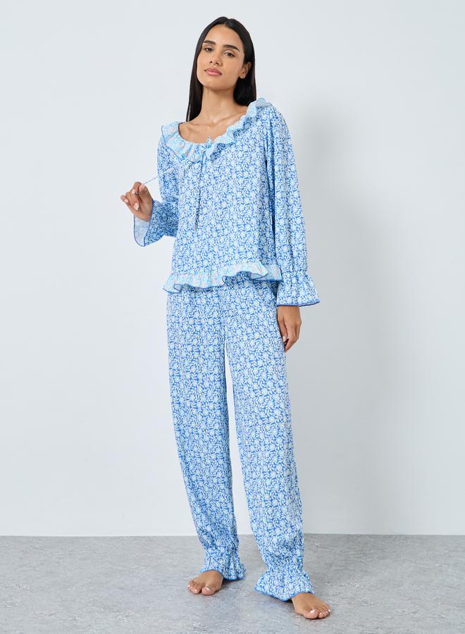 ستايلي طقم من بنطال بيجاما وبلوزة بطبعة زهور - Image 3