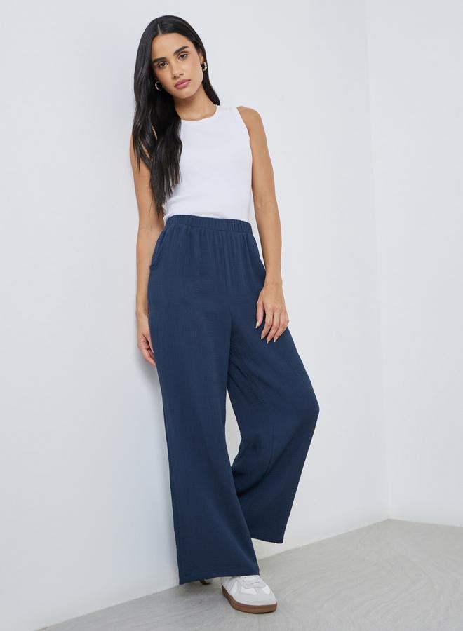 Styli Women Navy Blue Double Gauze Wide Leg Pants - Image 1