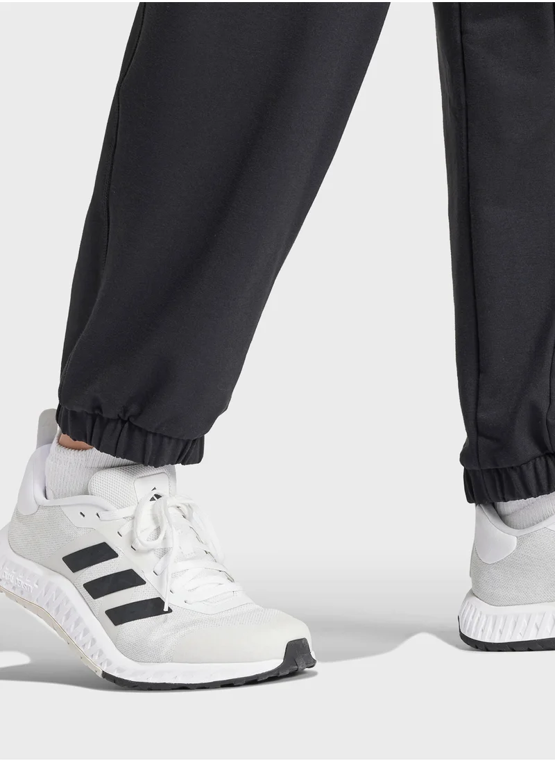 اديداس Power Loose Fit French Terry Sweatpants