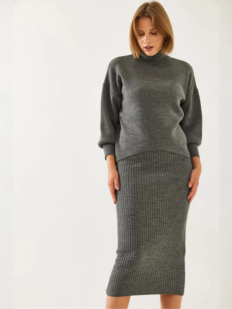 بيانكو لوتشي طقم محبوك بياقة مدورة مضلعة من لوكسي