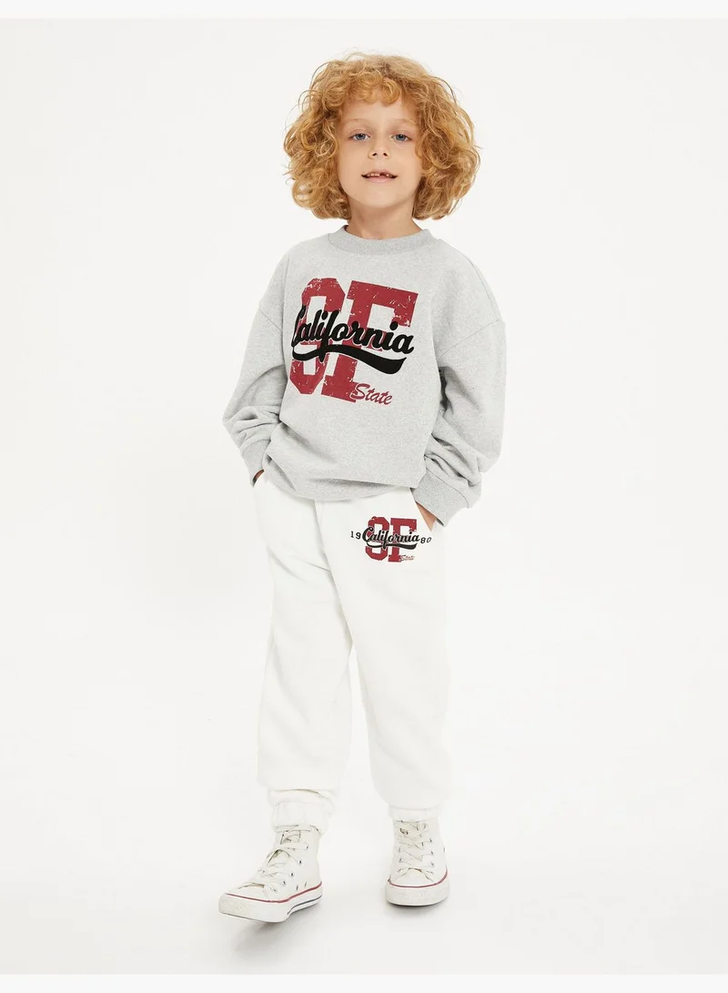 كوتون Varsity Sweat Brushed Interior Long Sleeve Crew Neck Printed