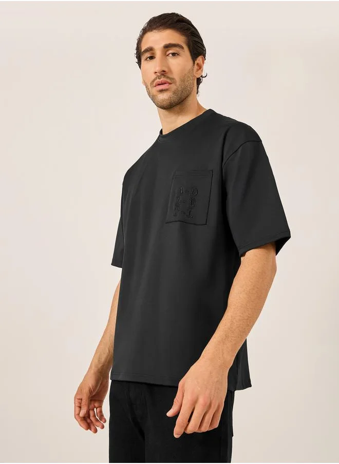 Styli Embroidered Pocket Oversized T-Shirt