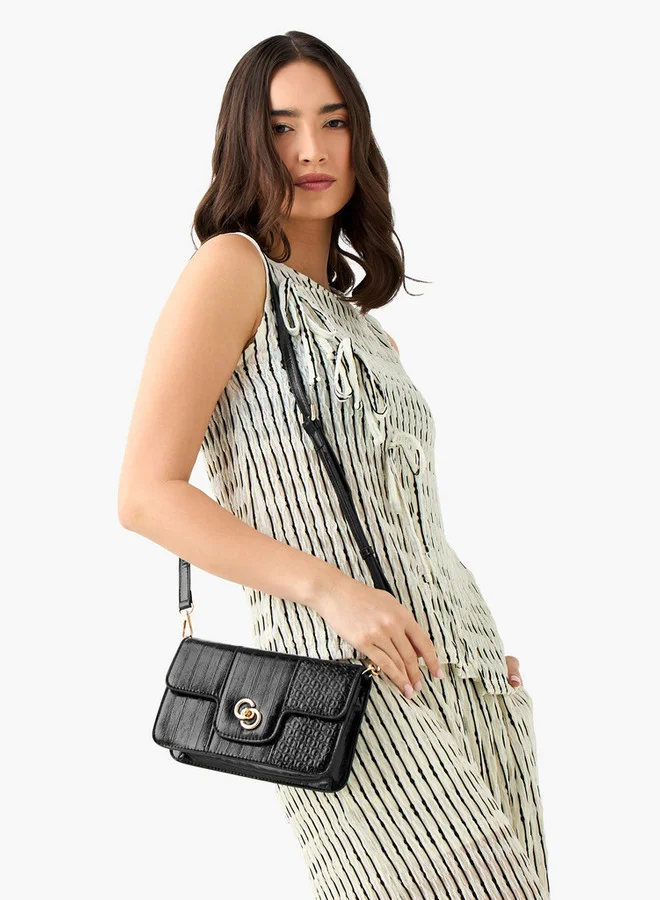 Celeste Monogram Embossed Crossbody Bag with Twist Lock Closure