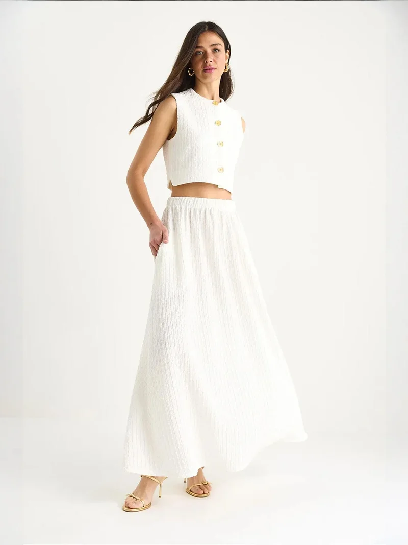 بيانكو لوتشي طقم لوكسي طويل محكم بجيوب وأزرار