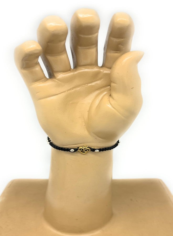 Jyokrish Handmade Adjustable Silk thread Gold Plated Om-2 Religious Symbol bracelet for |Men |Boys |Girls |Women | Free Size |Pack of 1 |Hand band |Lucky Charms (Black) - Image 1