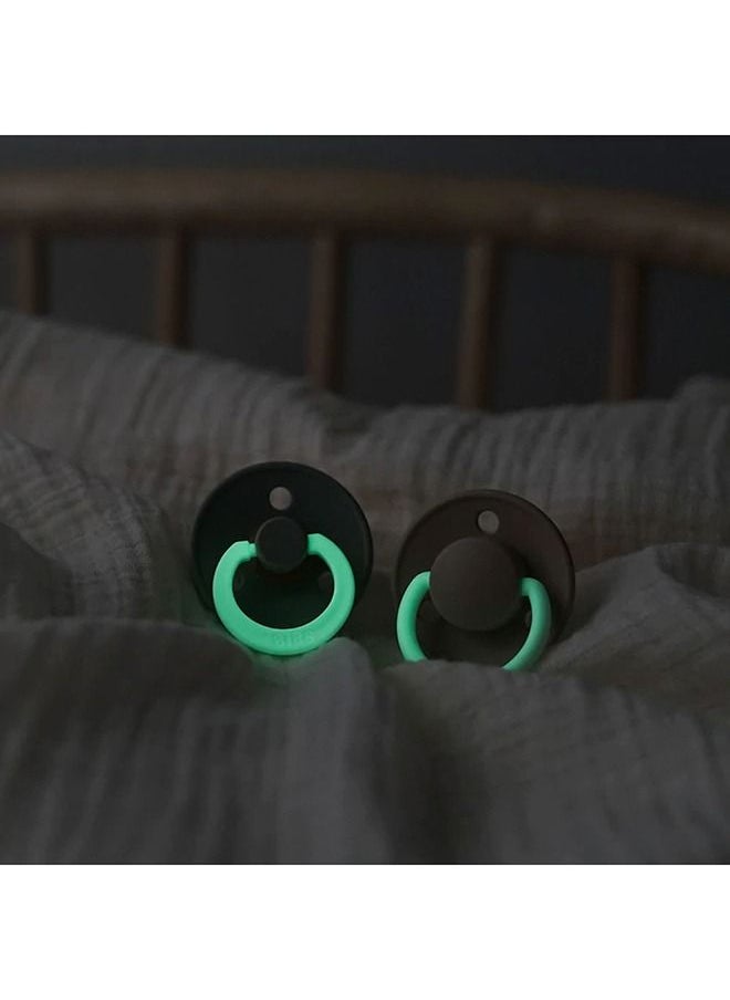 BIBS - Pack of 2 Colour Glow Soother Glow In The Dark Bpa Free Dummy Pacifier, Round . Natural Rubber Latex, Size 2 6 18 Months , Iron Night/Baby Blue Night, 6 - 18 Months - Image 1