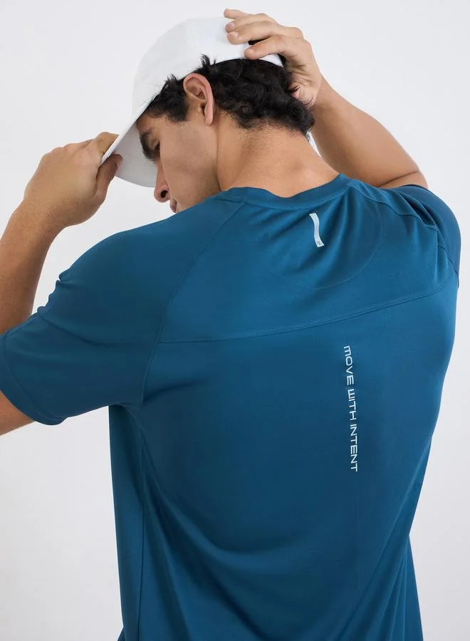 Styli  Men Back Reflective Print Raglan Sleeve Active T-Shirt for Men | Best Price UAE
