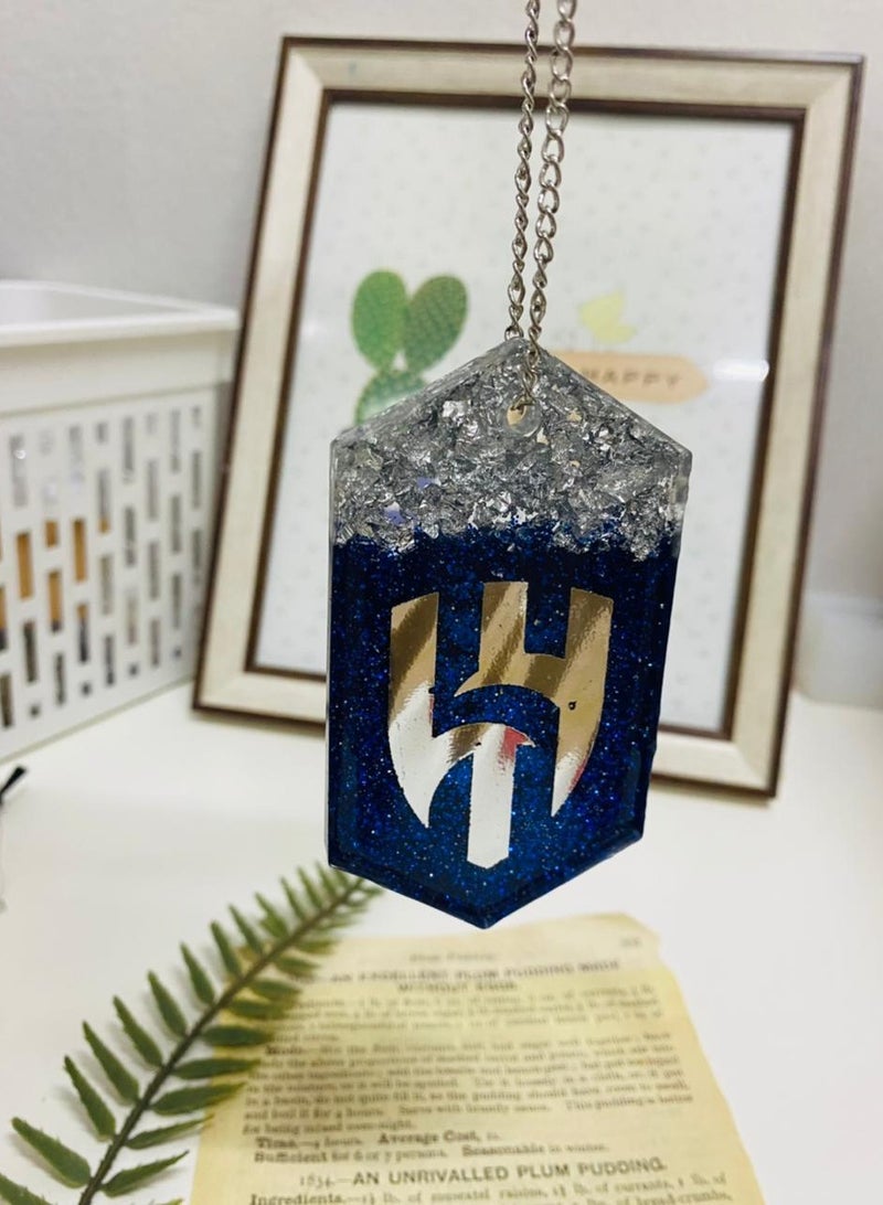 An elegant car pendant in the shape of a shiny diamond, the crescent logo, made of luxurious resin - Image 2