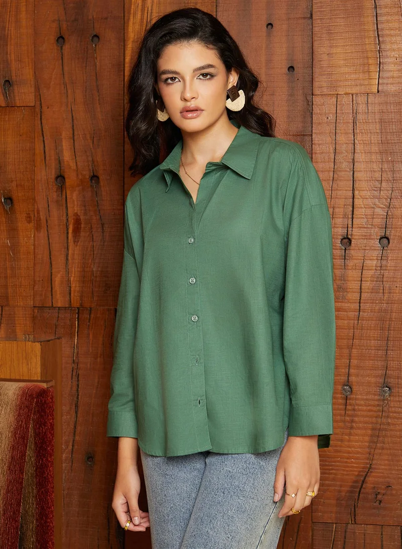Campus Sutra Women's Jade Green Solid Oversized Shirt For Casual Wear | Spread Collar  | Long Sleeve | Button Closure | Oversized Shirt Crafted With Comfort Fit For Everyday Wear