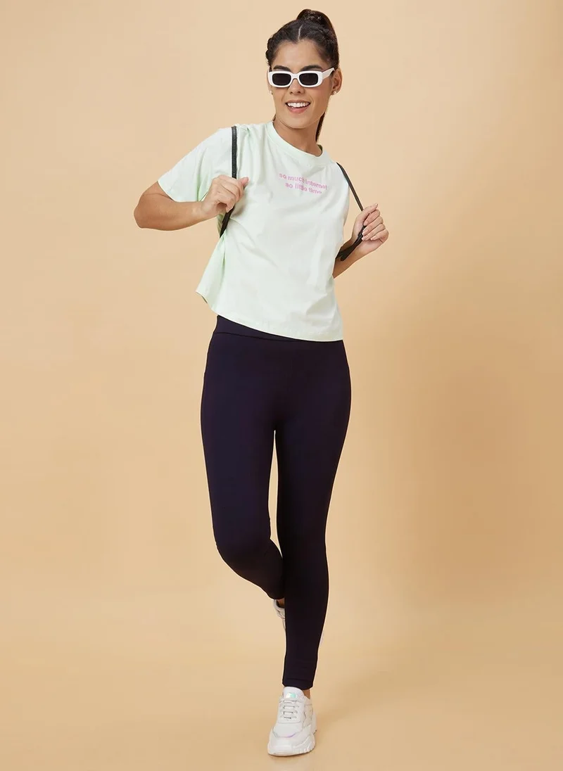 جلو باص تيشيرت قطن نقي بطبعة حروف نسائي أخضر