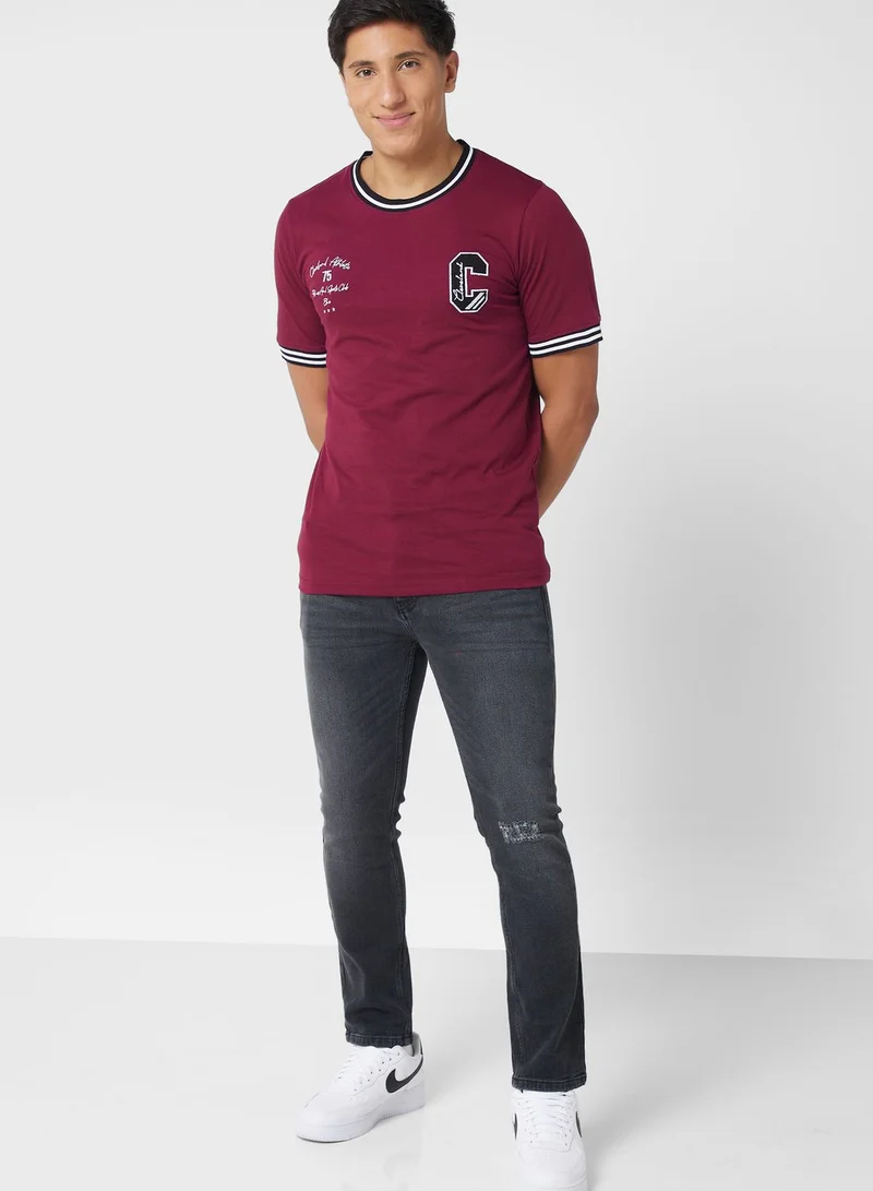 Seventy Five Varsity T-Shirt