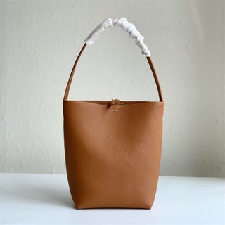 The Row genuine leather bucket bag large capacity commuter tote bag womens lychee pattern Fashion shoulder bagCaramel medium Caramel medium - pzsku/ZF73E0A124D9CCFDC8AE9Z/45/1746231230/2e243ad1-af86-47c8-b567-fd1b078d43dc