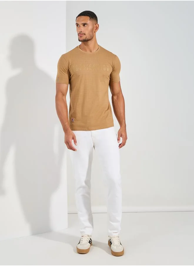 فورت كولينز Slogan Placement Print Crew Neck T-Shirt by Styli