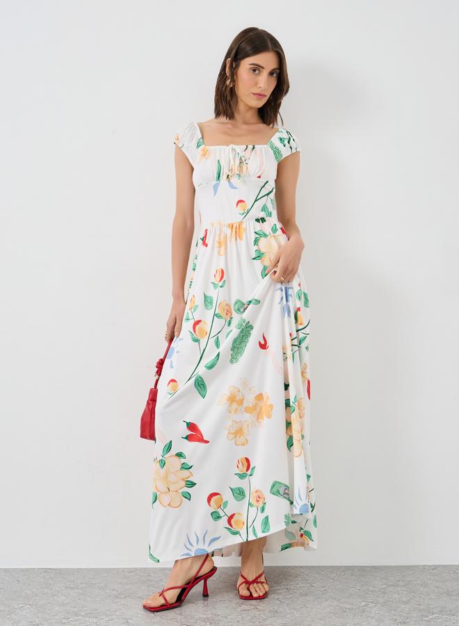 تايك تو فستان ماكسي بتفاصيل مزمومة وطبعة زهور من تيك تو - Image 1