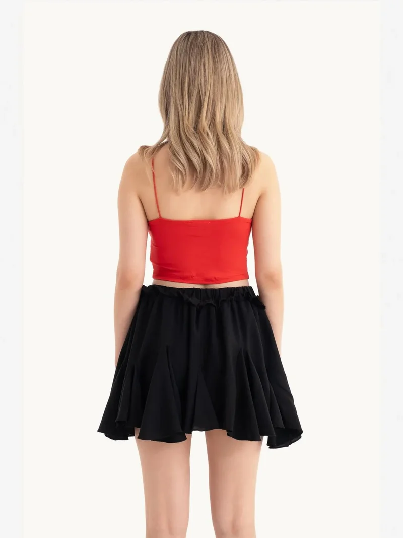 زوبعة تنورة قصيرة بخصر مرتفع وطيات وتفاصيل خصر