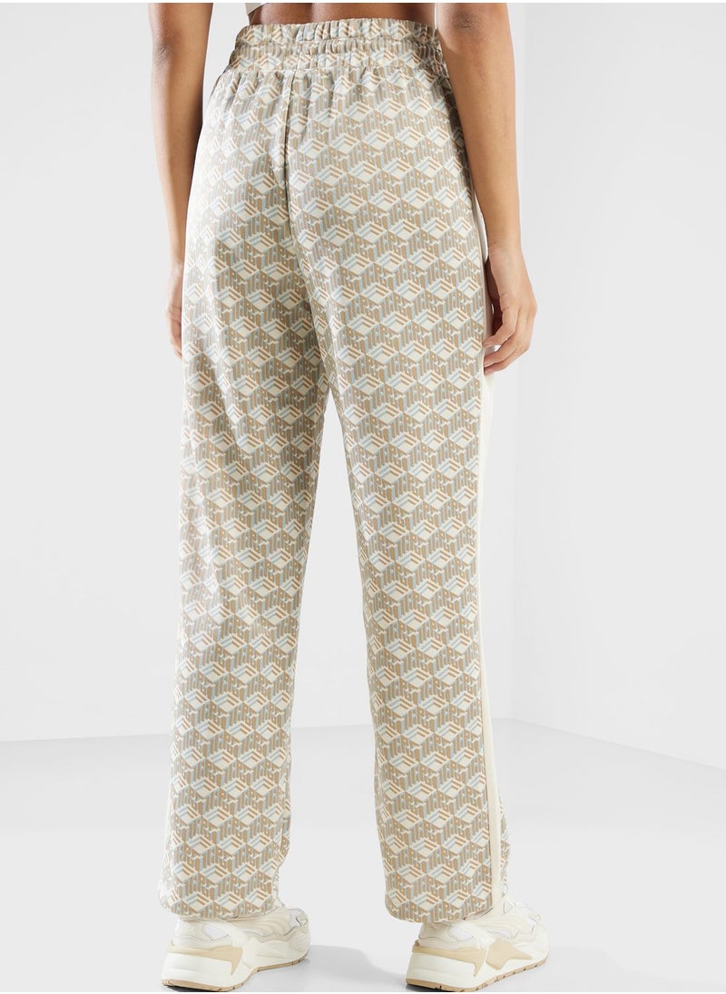 PUMA - T7 All Over Printed Track Pants - Image 1