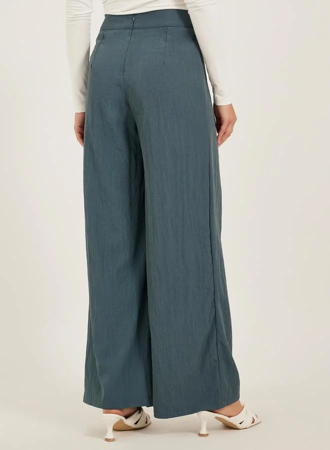 Styli Styli Solid Twill Pleated Wide Leg Pants with Cross Waistband