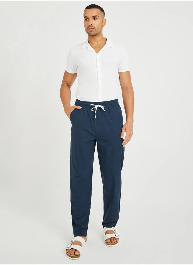 ستايلي Styli Men Navy Blue Textured Drawstring Regular Fit Pants