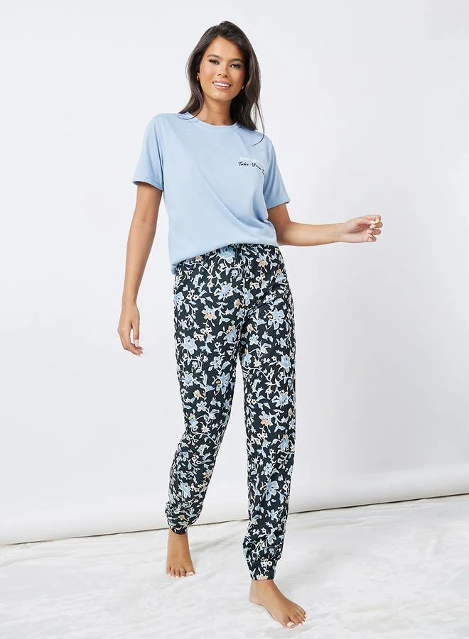 Styli Slogan Print T-Shirt & AOP Cuffed Pyjama Set