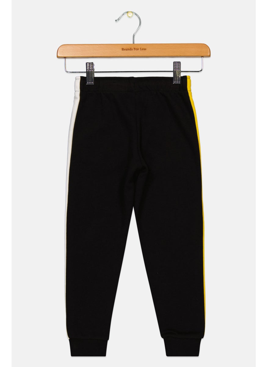 PUMA Kids Boy Sportswear Fit Brand Logo Sweatpants, Black/Yellow/White  - Image 2