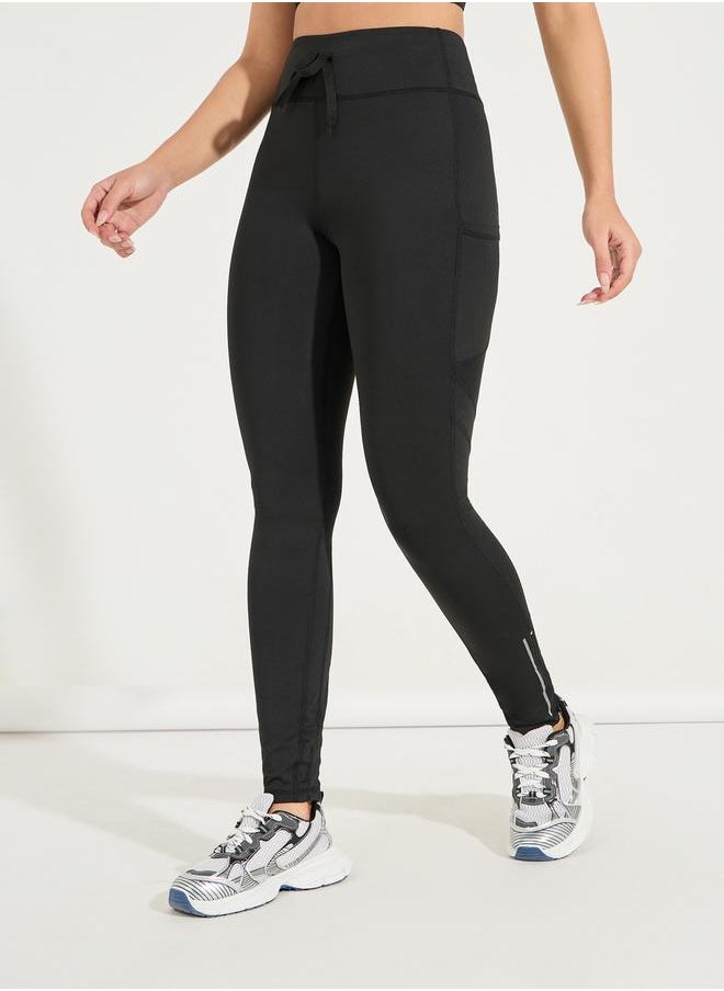 Reflective Ankle Zip Detail Side Pocket Leggings - pzsku/ZF789F1ECC88A05E7AB01Z/45/_/1728492874/14242368-af4c-4649-a2ca-b08997e73dfd